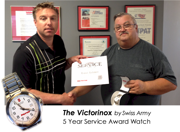 Thomas McKee awarding Lionel Lefebvre for 5 years of service