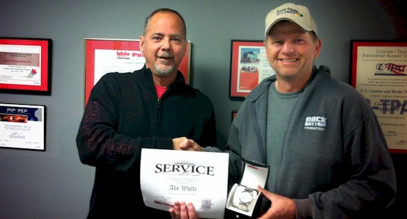 Abe Wolfe receiving award