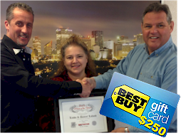 Patrick awarding Linda and Dan with 2nd runner up award