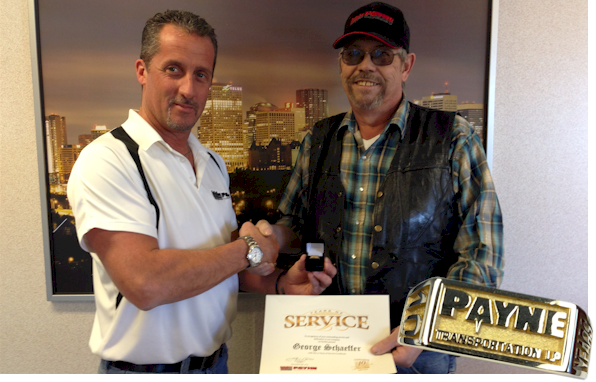 Patrick awarding George his ring